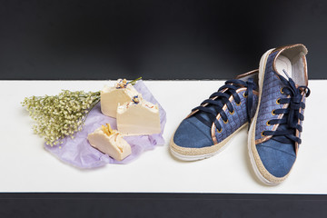 Set of shoes, soap and aroma bouquet of dried flowers