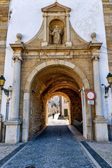 Fototapeta na wymiar Closeup view of the Arch of Faro, main entrance to old town Faro, Portugal