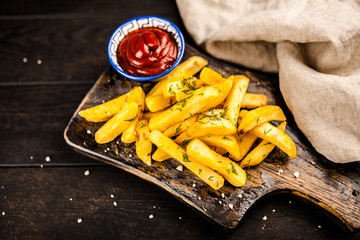 French fries on wooden table
