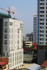 Cityscape in Phnom Penh, the capital of Cambodia, Asia. Asian buildings, architectural background.