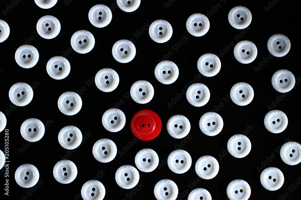 Poster white buttons on a dark background and someone else's button of another color