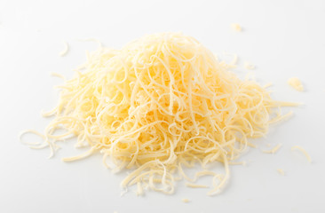 Grated cheese on white