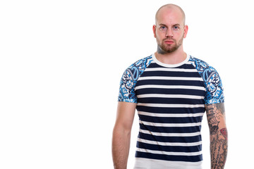 Obraz premium Studio shot of young bald muscular man