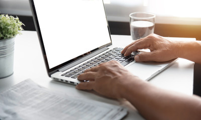 Senior man hands using laptop.