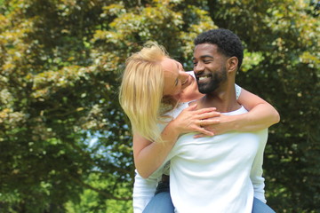 Fototapeta premium Beautiful happy love couple in the park