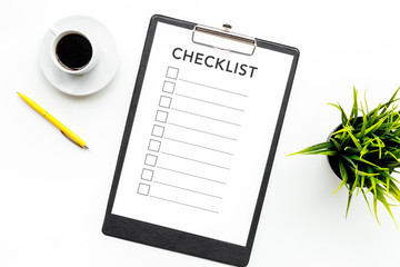 Blank checklist with space for ticks on pad on office desk. Checklist for office worker, manager,...