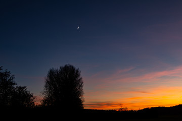 Sonnenuntergang mit Mond