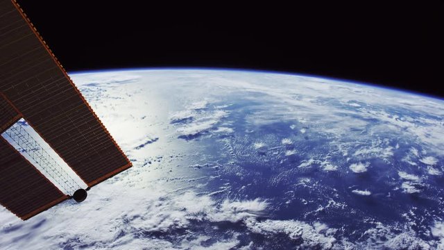 International Space Station flies over Earth, wide