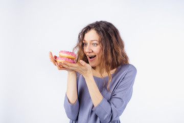 Young woman wants to eat donuts