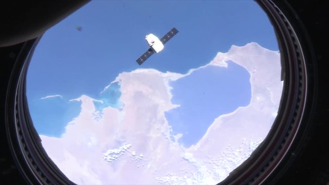 View of satellite over earth, high angle