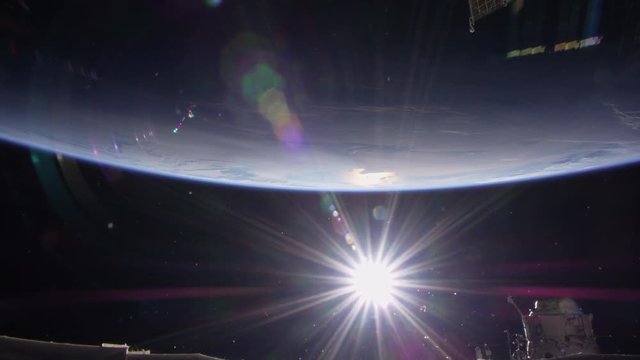 Sun rises over Earth, upside down view