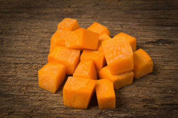 Carrot cube on old wood