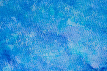 blue watercolor painted on paper background texture