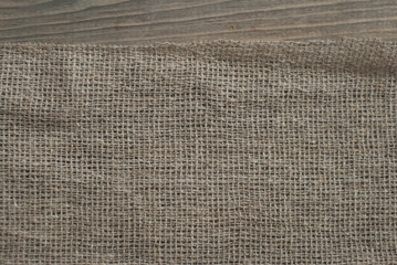 Burlap Rustic Texture on Wooden Table Background