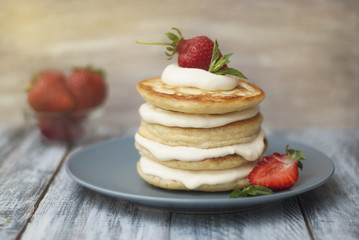 Dessert Pancakes with Cream and Strawbery. Health Breakfast Fruit Berry Vitamine Gray Rustic Wooden Background