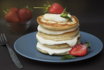 Dessert Pancakes with Cream and Strawbery. Health Breakfast Fruit Berry Vitamine Black Background