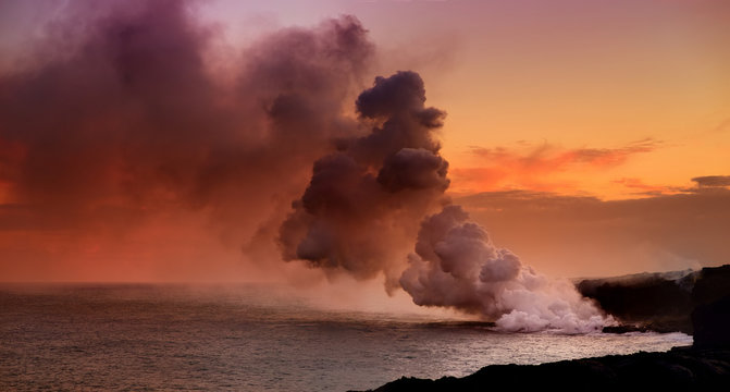 Lava pouring into the ocean creating a huge poisonous plume of smoke at Hawaii's Kilauea Volcano, Volcanoes National Park, Hawaii
