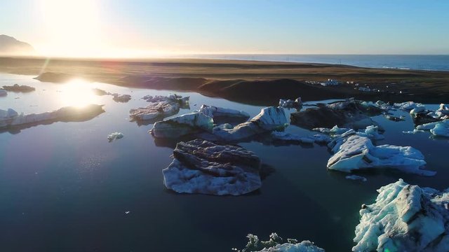 4K Aerial movie Flyover Over Glacier Pieces Lagoon ,Jokulsarlon In Iceland 