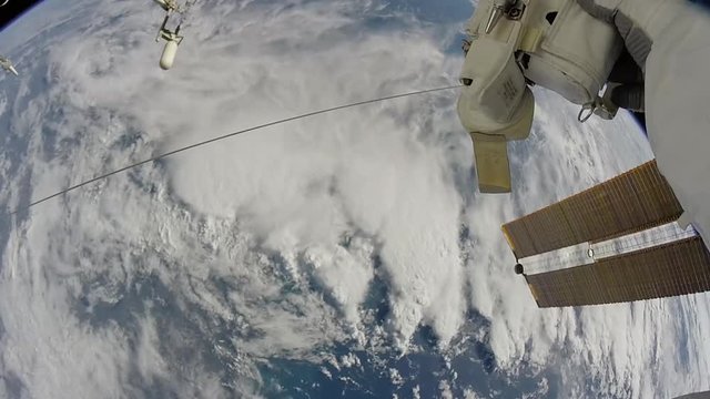 Astronaut looks over Earth, POV