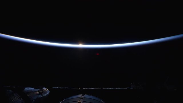 Scenic sunrise over Earth, wide