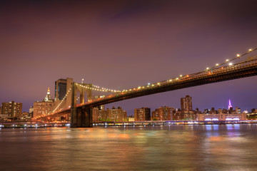 Fototapeta na wymiar Brooklyn Bridge in New York City at sunset.