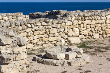 Ancient well of the ancient city against the sea