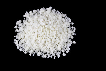 Sea salt close-up isolated on a black background