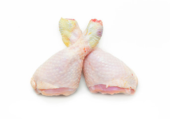 Two Raw chicken legs on white background. Organic Chicken. Healthy food.