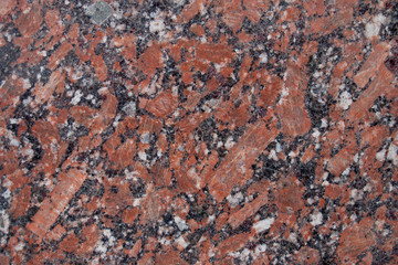 Granite texture with black and gray spots. Used as a background.