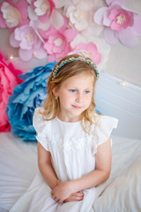 Cute little girl dreams of becoming a princess