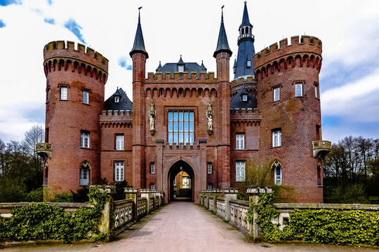 ccess road over the bridge towards Moyland Castle in Germany
