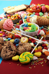 candies with jelly and sugar. colorful array of different childs sweets and treats