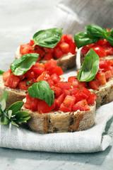 fresh tomato bruschetta. italian food appetizer with basil