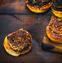 round sweet buns with cinnamon and walnut