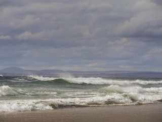 Waves crushing on the coast of The Atlantic ocean, Galway bay.