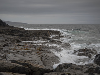 Rough terrain on west coast of Ireland, Atlantic ocean. 
