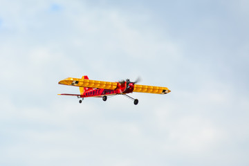 Obraz na płótnie Canvas Homemade radio control aircraft on blue sky.