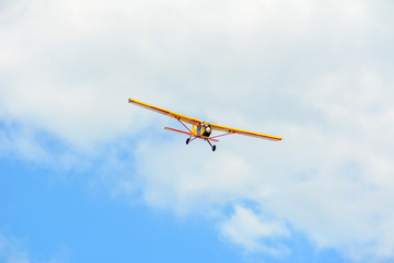 Homemade radio control aircraft  on blue sky.