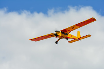 Fototapeta na wymiar Homemade radio control aircraft on blue sky.