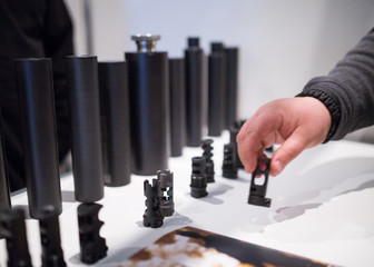 Flash suppressors or muzzle brakes of a modern assault rifles. Silencers, sound suppressors, or...