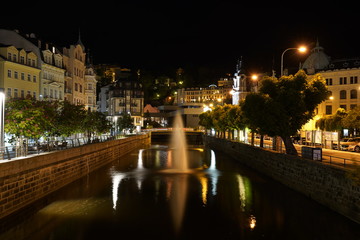 Fototapeta na wymiar View at the beautiful streets and the river in Calrsbad (Karlovy Vary), Czech Republic at night