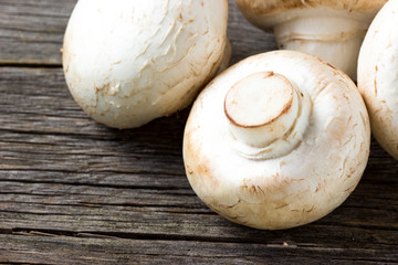 Champignons on a wooden table.