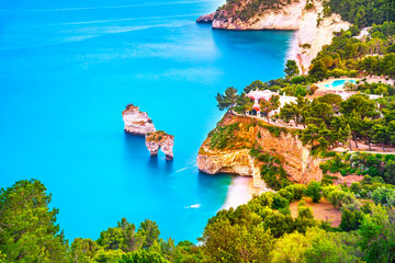 Mattinata Faraglioni stacks and beach coast, Vieste Gargano, Apulia, Italy.