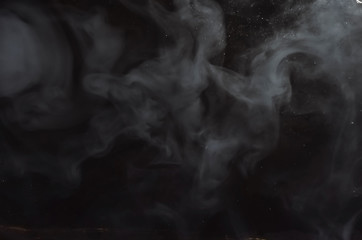 smoke on a black background. texture and background