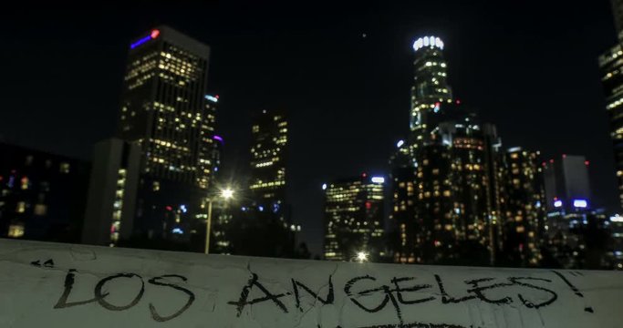 Los Angeles graffiti in front of downtown skyline - UHD 4k