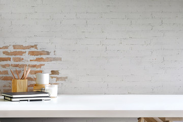 Workspace desk mockup black blank poster and artist accessory with copy space.