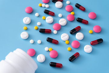 medicine  pills on blue background Copy space for text Assorted pharmaceutical Healthy Eating, Lifestyle