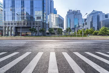 Zelfklevend Fotobehang Empty Road with modern business office building  © MyCreative