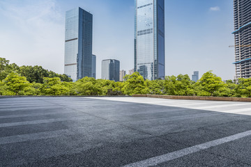 Fototapeta premium Empty Road with modern business office building 