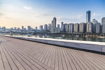 Fototapeta na wymiar Panoramic skyline and buildings with empty concrete square floor，chongqing city，china